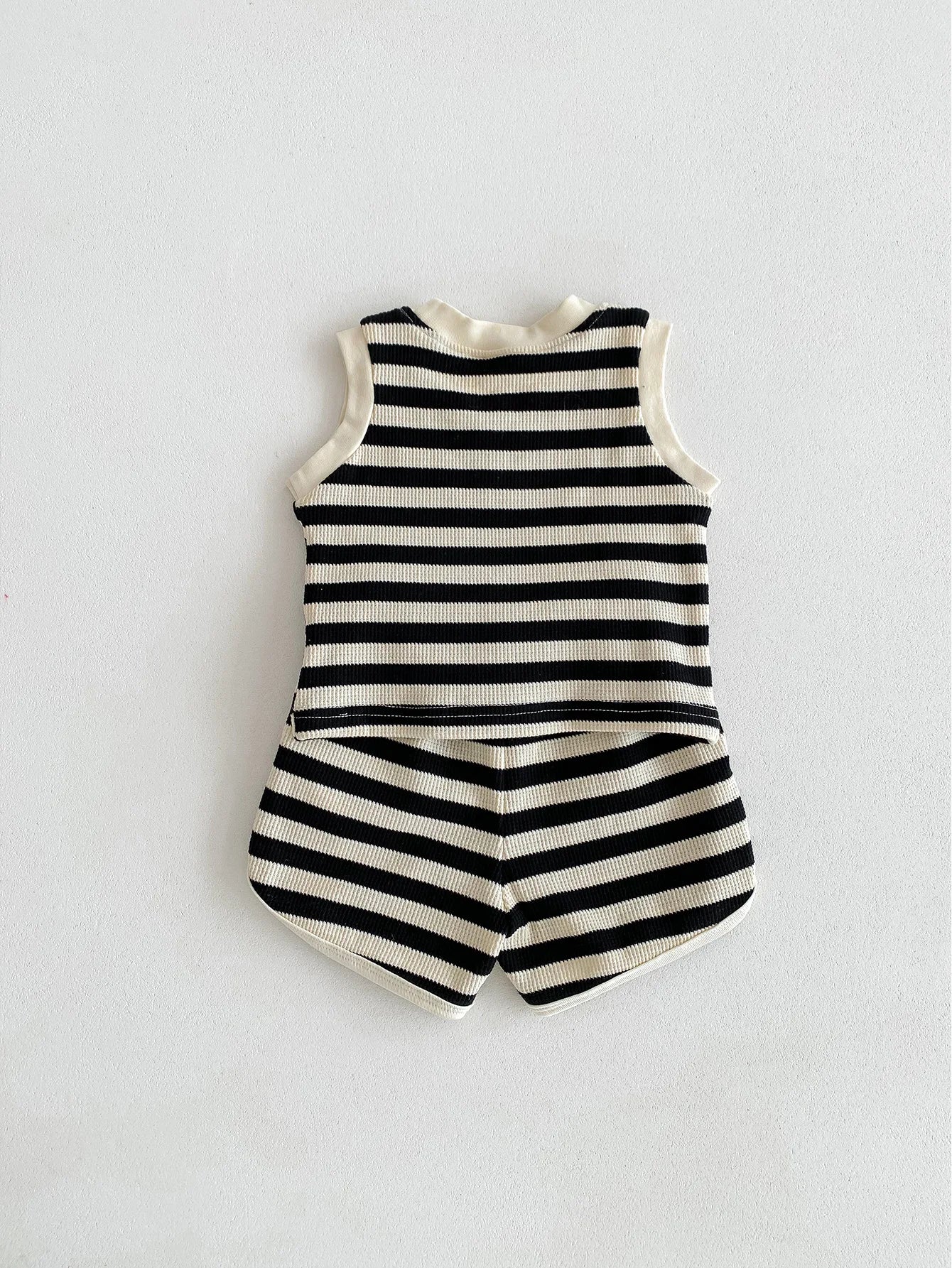 MILANCEL 2024 baby sleeveless set featuring black and white striped tee and shorts for boys.
